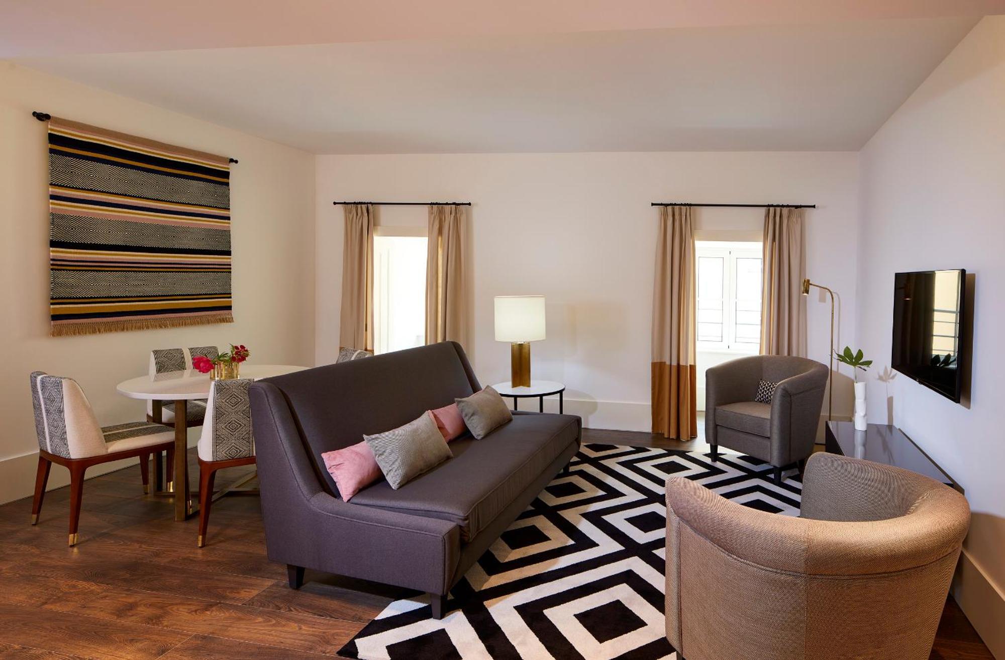 路米亚罗斯水疗酒店 Lisboa 外观 照片 A living room at the Hotel Commonwealth